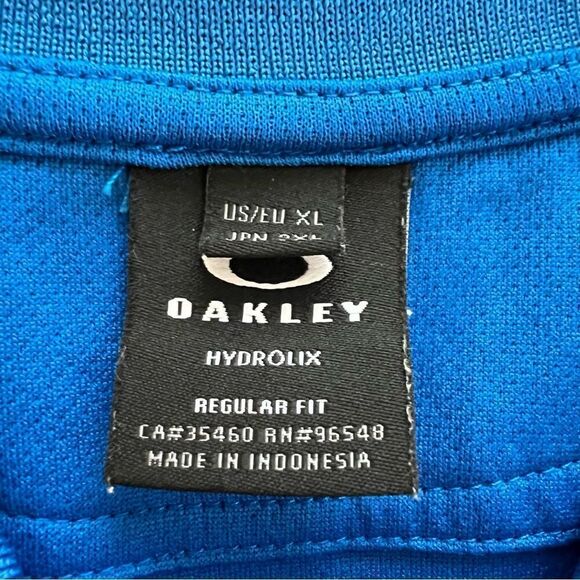 Oakley Men’s Blue Divisional UV Men’s Polo Shirt size XL - Picture 6 of 11